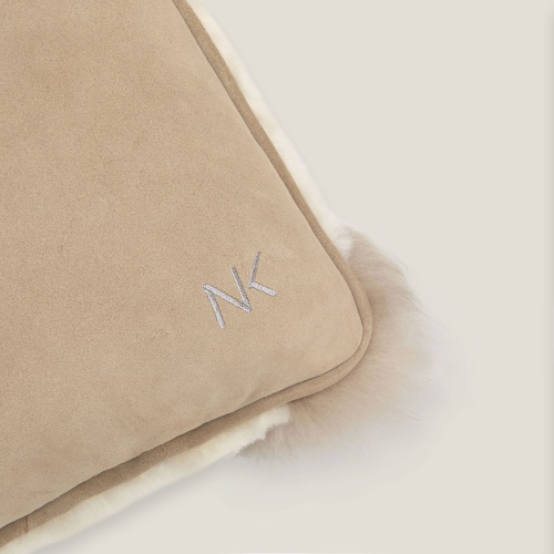 The embroidery of your choice on your top-of-the-range Norki cushion.