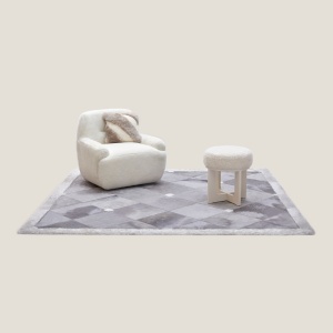 Louis Rug by Norki, in white cowhide and sheepskin.