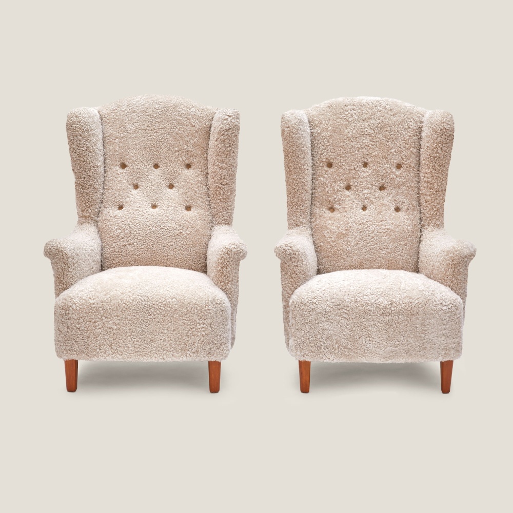 Pair of vintage wingback armchairs signed by one of the greatest designers of the 20th century, Carl Malmsten.