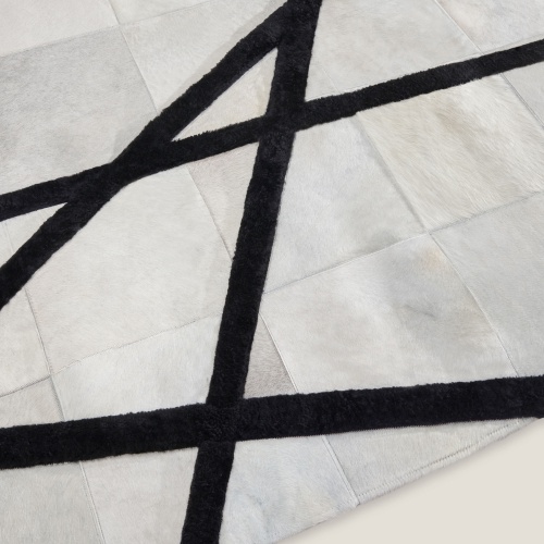 A play of materials forms the pattern of this rug, discover the luxury of a rug.