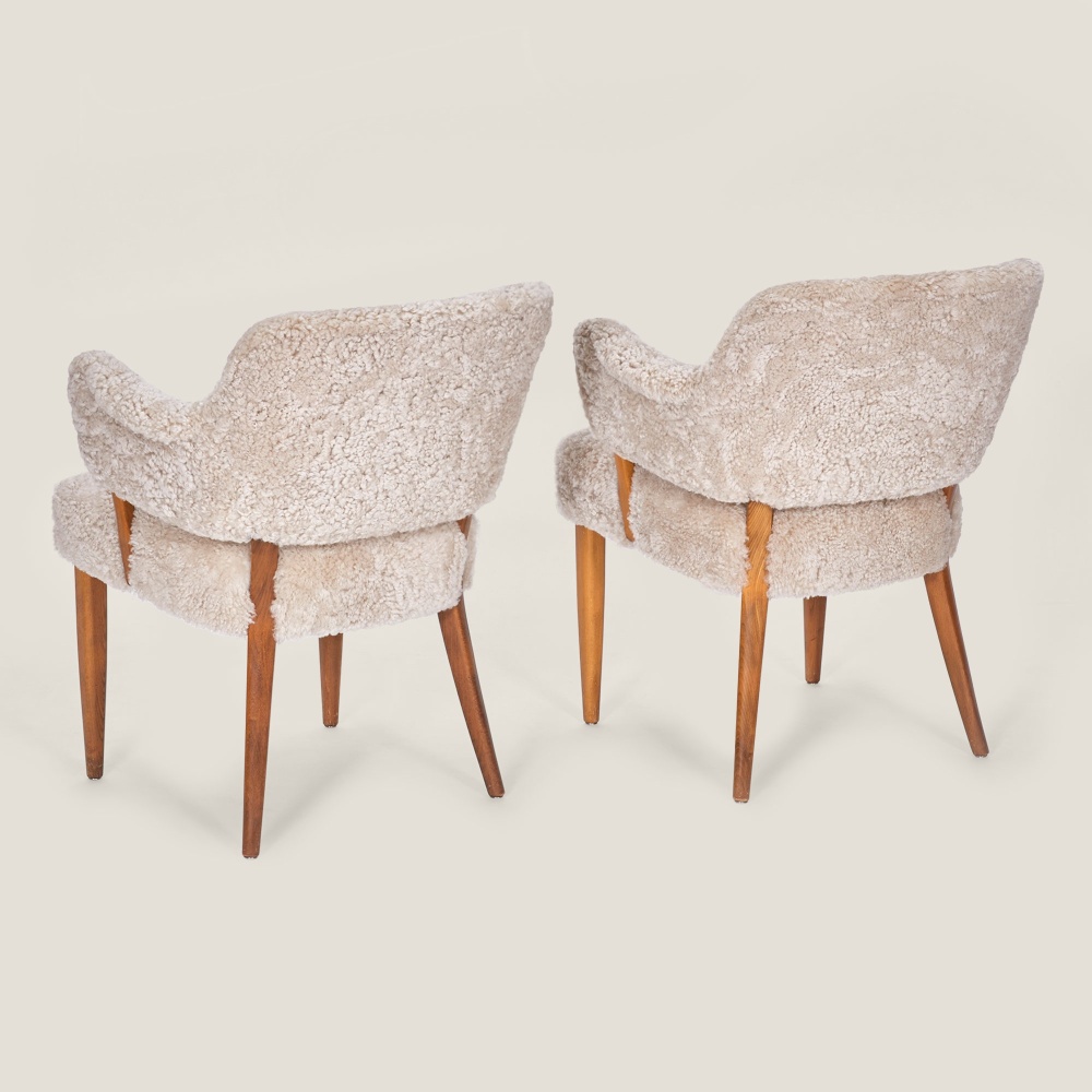 A limited edition pair of chairs, by the great designer Carl Malmsten.