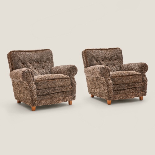 Pair of Dux mid-century armchairs, original edition in brown woollen hide.