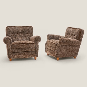 Pair of Dux mid-century armchairs, original edition in brown woollen hide.