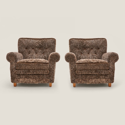 A pair of authentic armchairs made by Dux in Sweden in the 1950s.