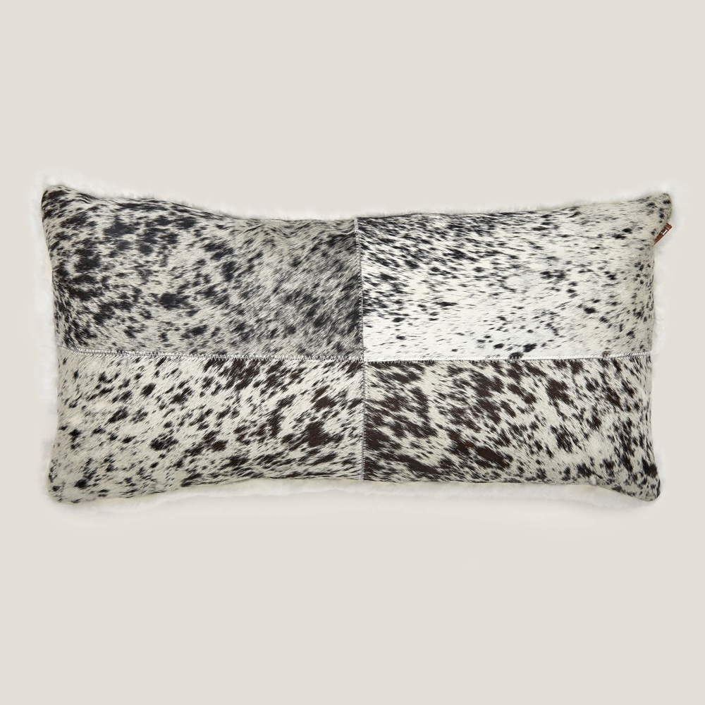 Rectangular Zima cushion with one side in white/grey mottled cowhide made in France by Norki.