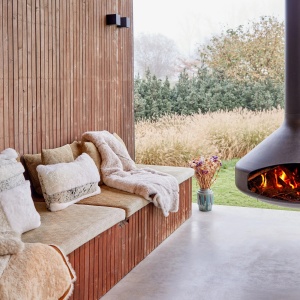 Square Zima rectangle cushion in mottled cowhide and natural sheepskin.