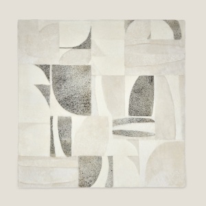 Zima square rug made from speckled cowhide, soft and white.