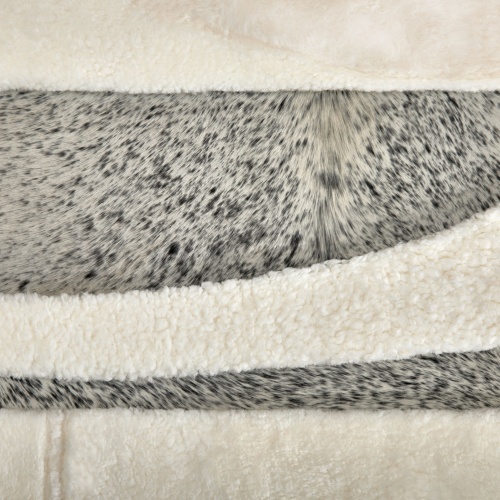 Details of the grey/white mottled cowhide of the Zima rug by Norki.