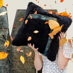 Square Forest cushion in black shearling and pattern in blue/green cowhide.