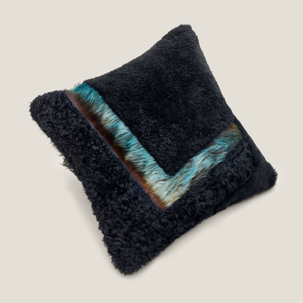 Elegant Forest cushion with contrasting colours and textures.