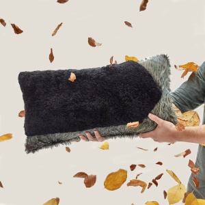 Our rectangle Forest cushion in cowhide and sheepskin, by Norki.