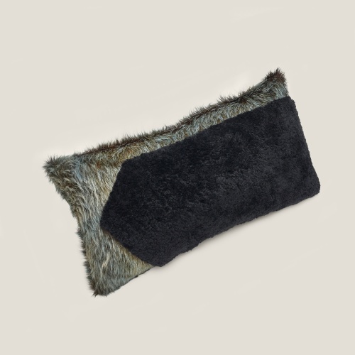 Forest cushion with one side in two-tone blue/green cowhide and geometric pattern in black sheepskin.