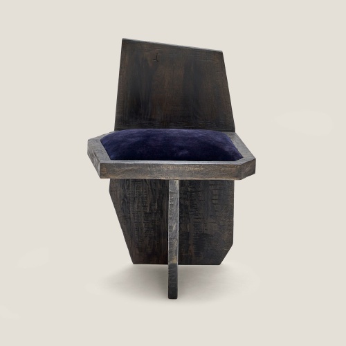 Front view of our Yaga chair in solid wood and comfortable seat in abyss blue velvet shearling.