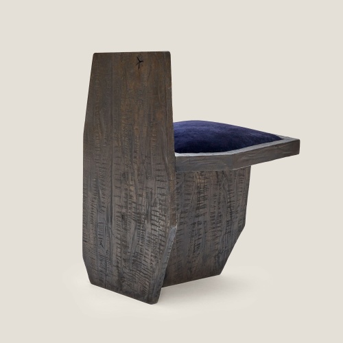 A brutalist wooden chair with simple, straight lines for a modern, rustic look.