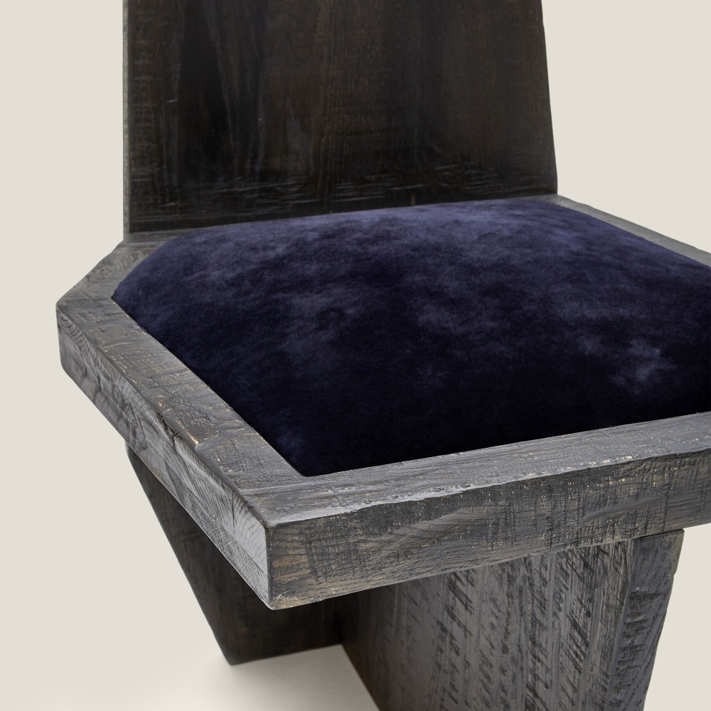 Focus on the abysmal blue velvet shearling upholstered seat of our brutalist Yaga by Norki chair.