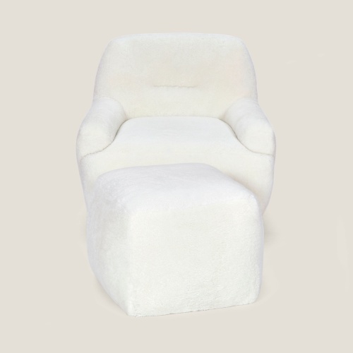 Armchair and footrest in natural white wool, design by Norki.