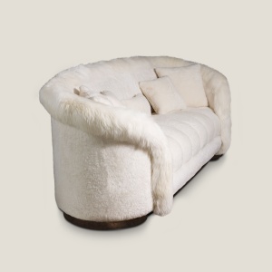 White sheepskin and finnraccoon sofa, comfortable and top-of-the-range.