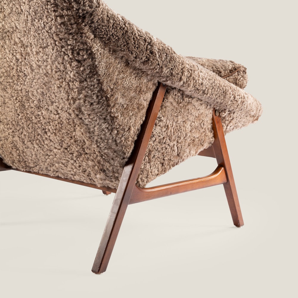 Modern Siesta armchair in sand sheepskin with ottoman, Scandinavian design by Svante Skogh.