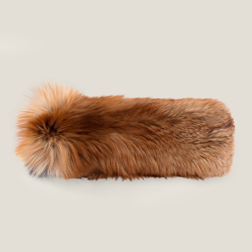 Rectangular cushion in genuine golden fox fur.