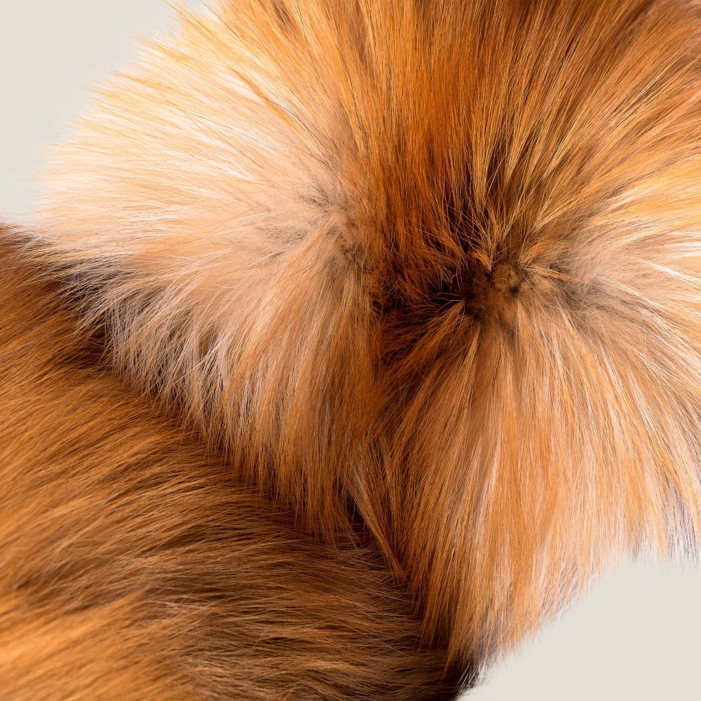 Focus on fox fur, the noble material used by Norki to make cushions.