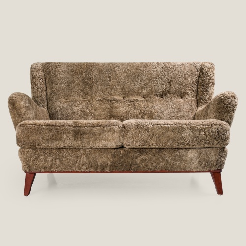 Vintage 2-seater sofa, comfortable and stylish, ideal for a cozy and chic living room.