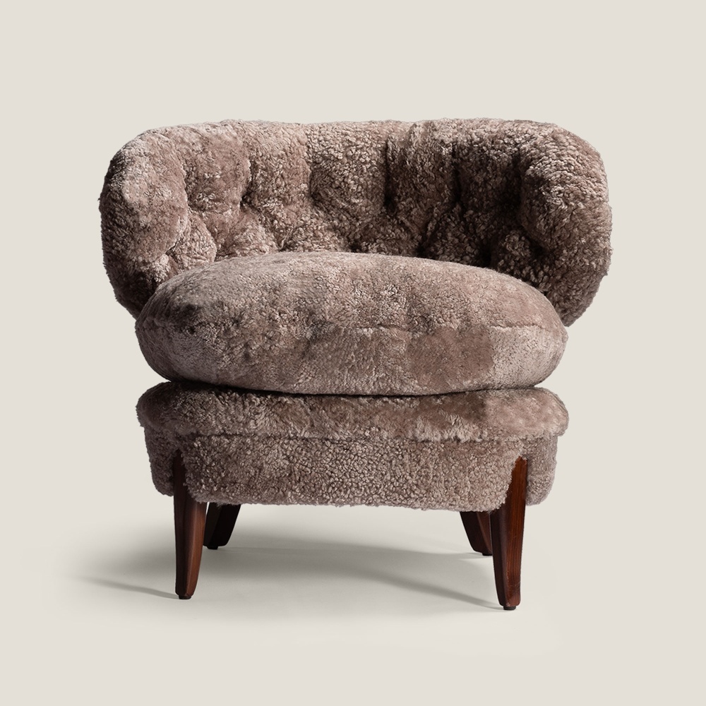 Rare designer armchair in high-end beige sheepskin Norki