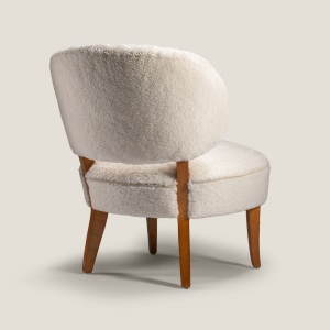 Fauteuil vintage blanc par le designer Carl Malmsten.