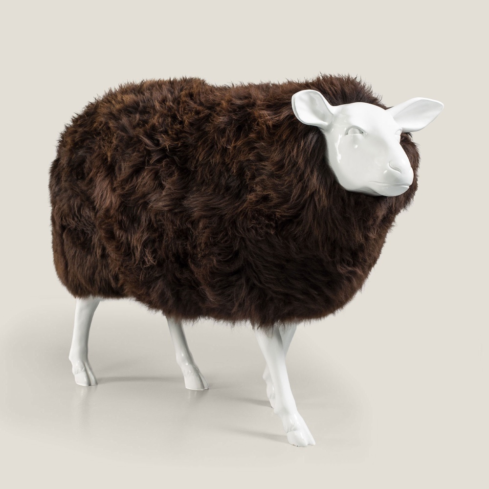 Sheep in smooth resin, covered in chocolate-tinted sheepskin.