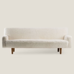 White shearling sofa designed by Hans J. Wegner