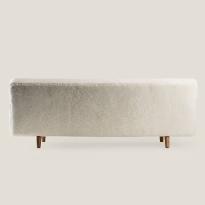 White shearling sofa designed by Hans J. Wegner