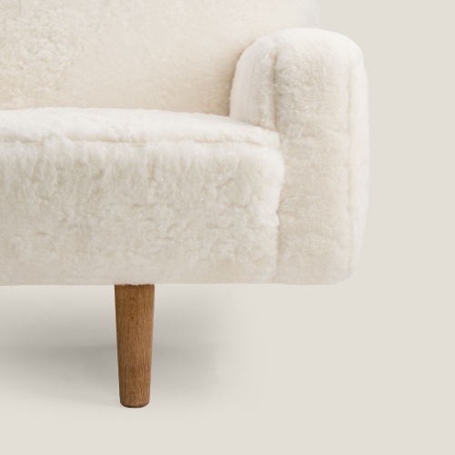 Elegant minimalist white shearling sofa