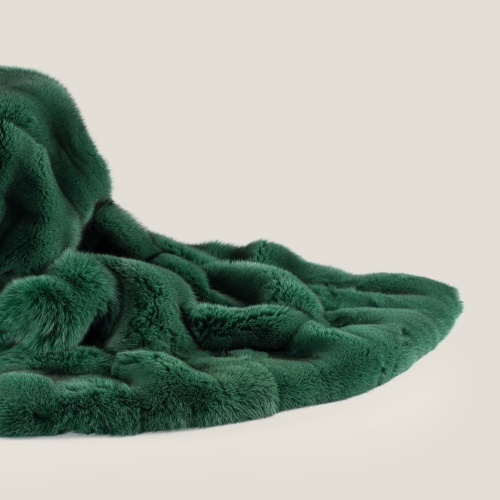 Cosy emerald green arctic fox throw by Norki.