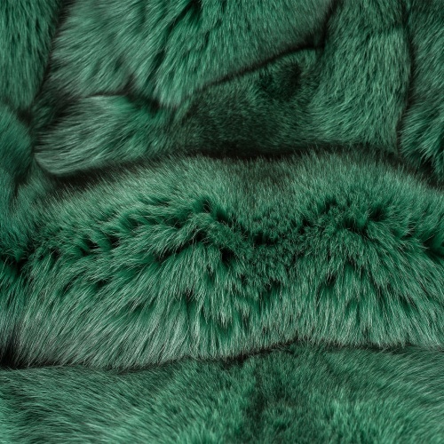 Detailed view of the soft texture of the Arctic fox fur throw.