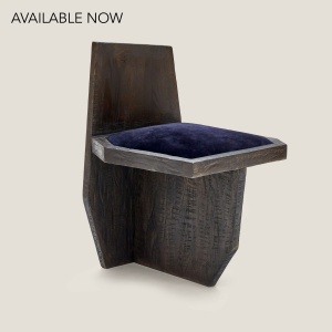 Modern, brutalist Yaga chair in solid wood.