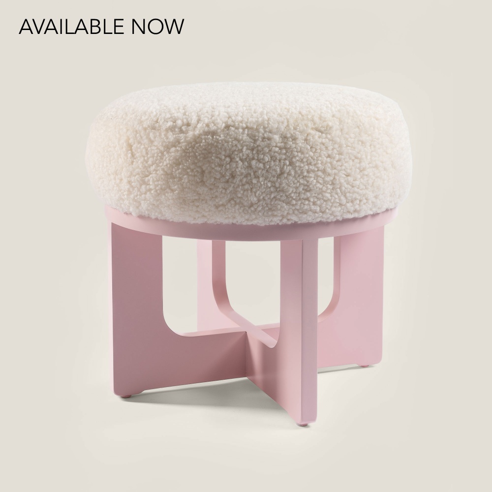 Buy a small round pouf to decorate a nursery or an elegant and feminine bedroom.