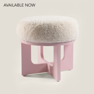 Buy a small round pouf to decorate a nursery or an elegant and feminine bedroom.