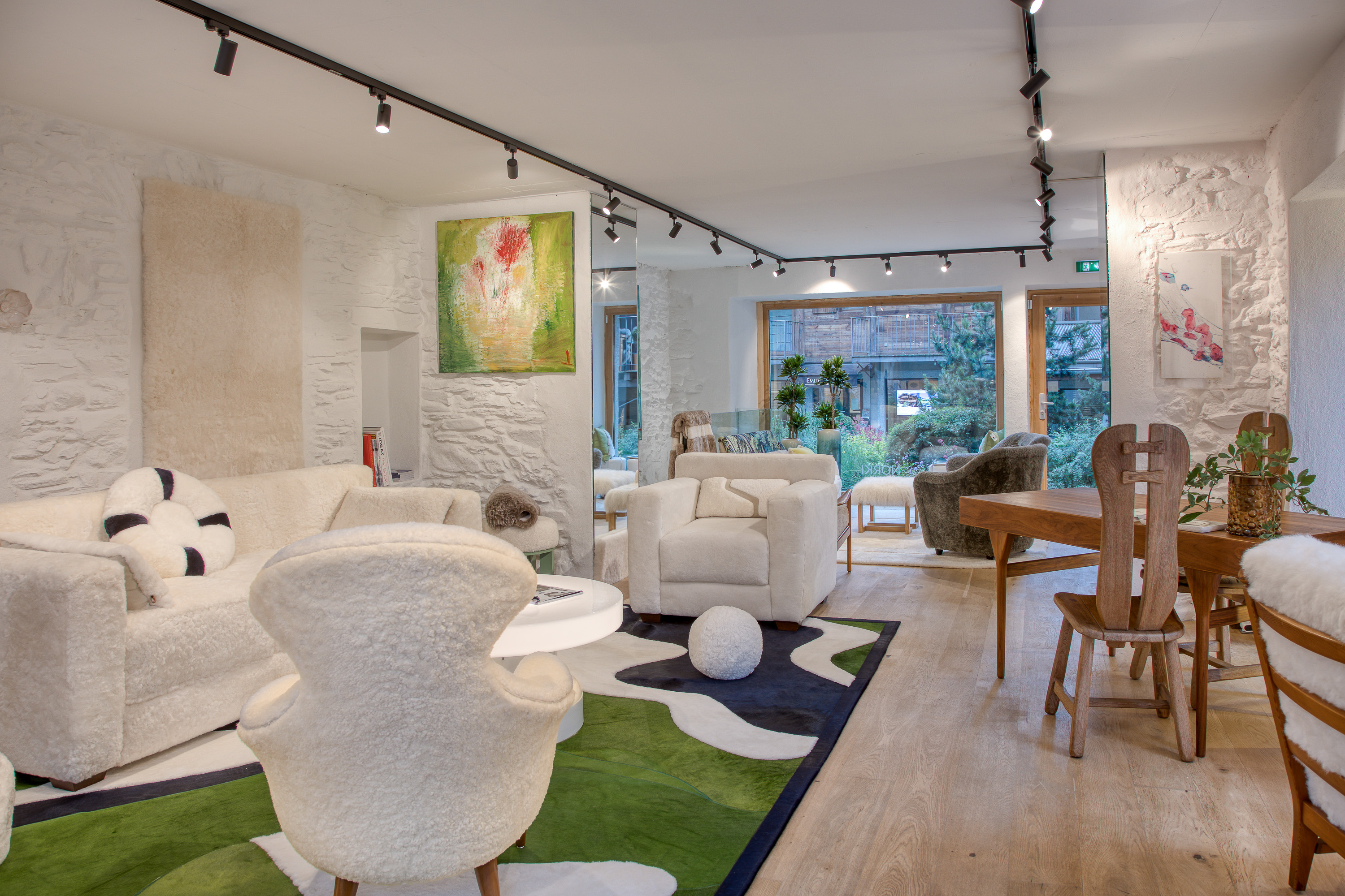 Luxury rugs, top-of-the-range armchairs, made-to-measure cushions and vintage collection pieces available in the Norki Alps Swiss boutique in Megève.