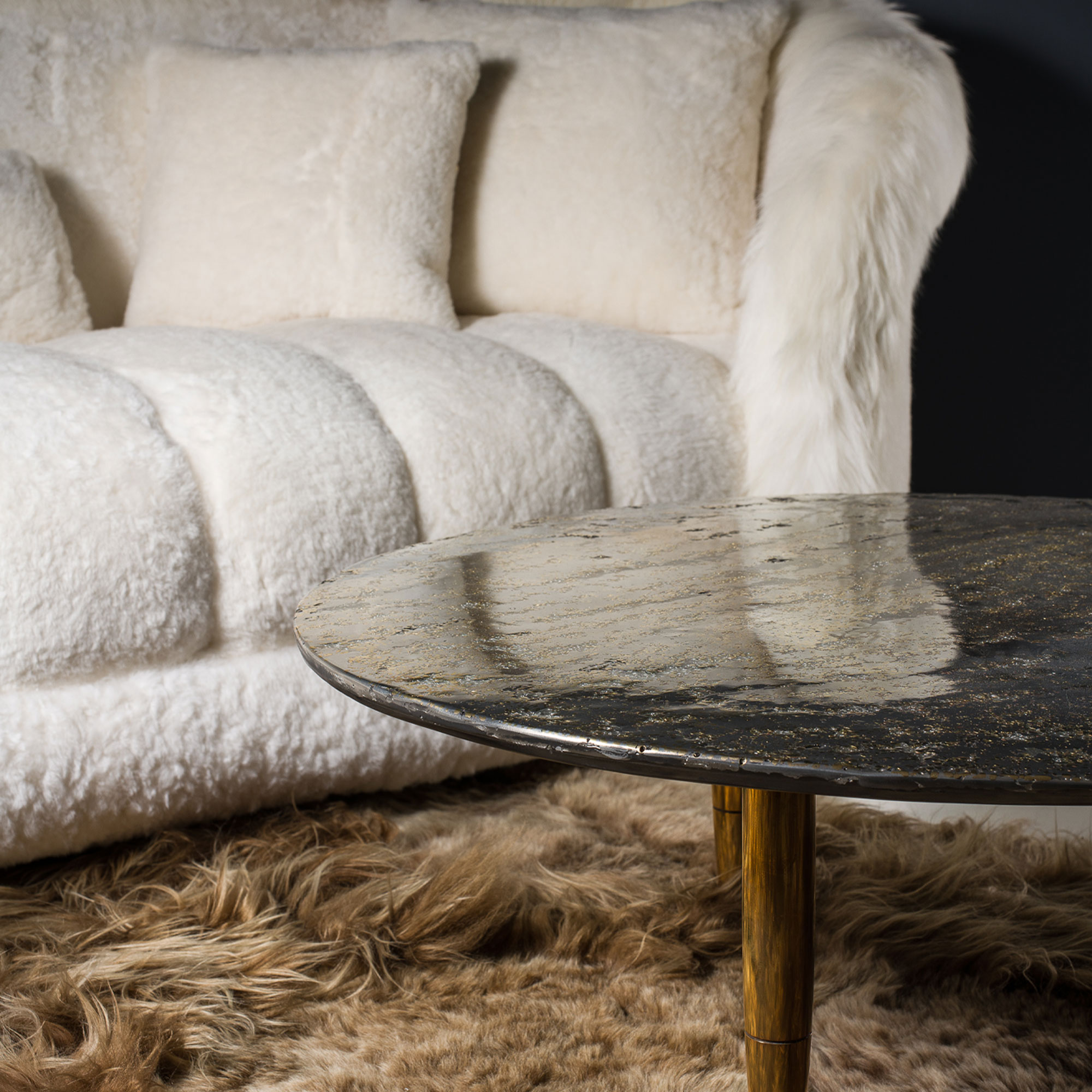 A white cloud sofa in sheepskin and fur for an exclusive decor.