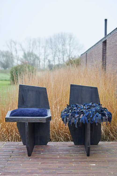 Two Brutalist-style designer chairs by Norki.