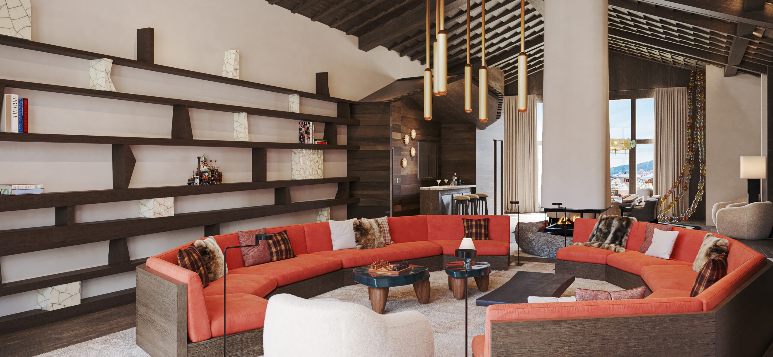 Intérieur de Studio Chalet Norki à Megève avec canapés rouges courbés