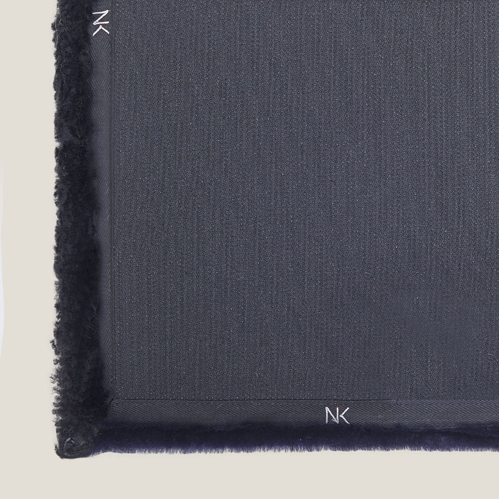 Détail du revers du tapis sur mesure