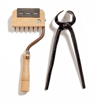 Outils traditionnels de tapissier